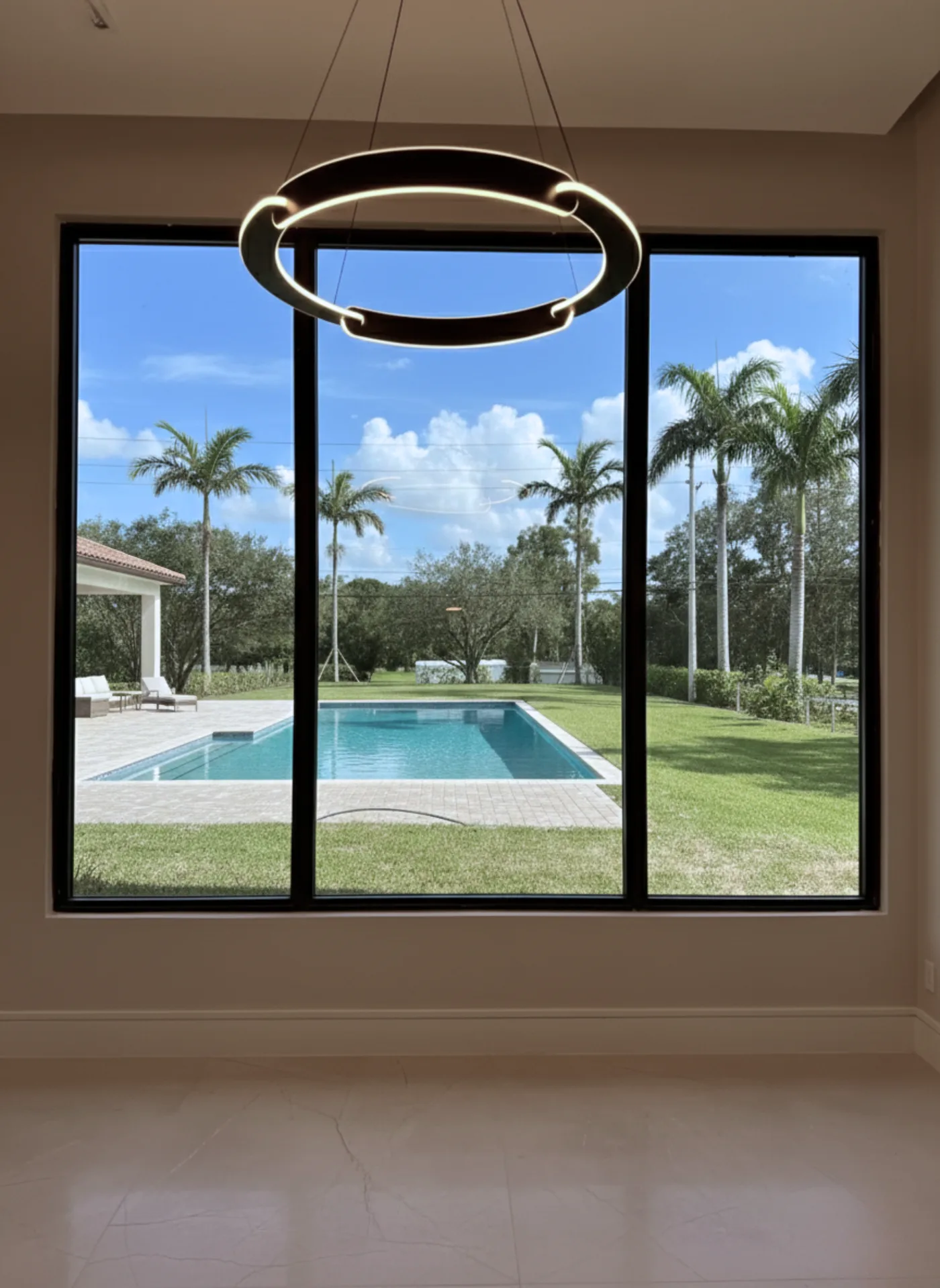 White impact windows across a residential facade